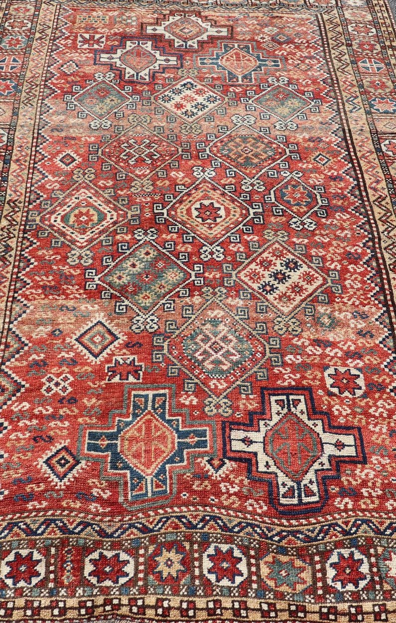 Antique Caucasian Kazak Rug with Geometric Design & Tribal Motifs Charming Antique Caucasian Kazak Rug with All - Over Geometric Motif Medallions. Keivan Woven Arts / rug /EMB - 22138 - 15048, country of origin / type: Caucasus / Kazak, circa 1890 ... - Keivan Woven ArtsEMB - 22138 - 15048 - 20523Rug