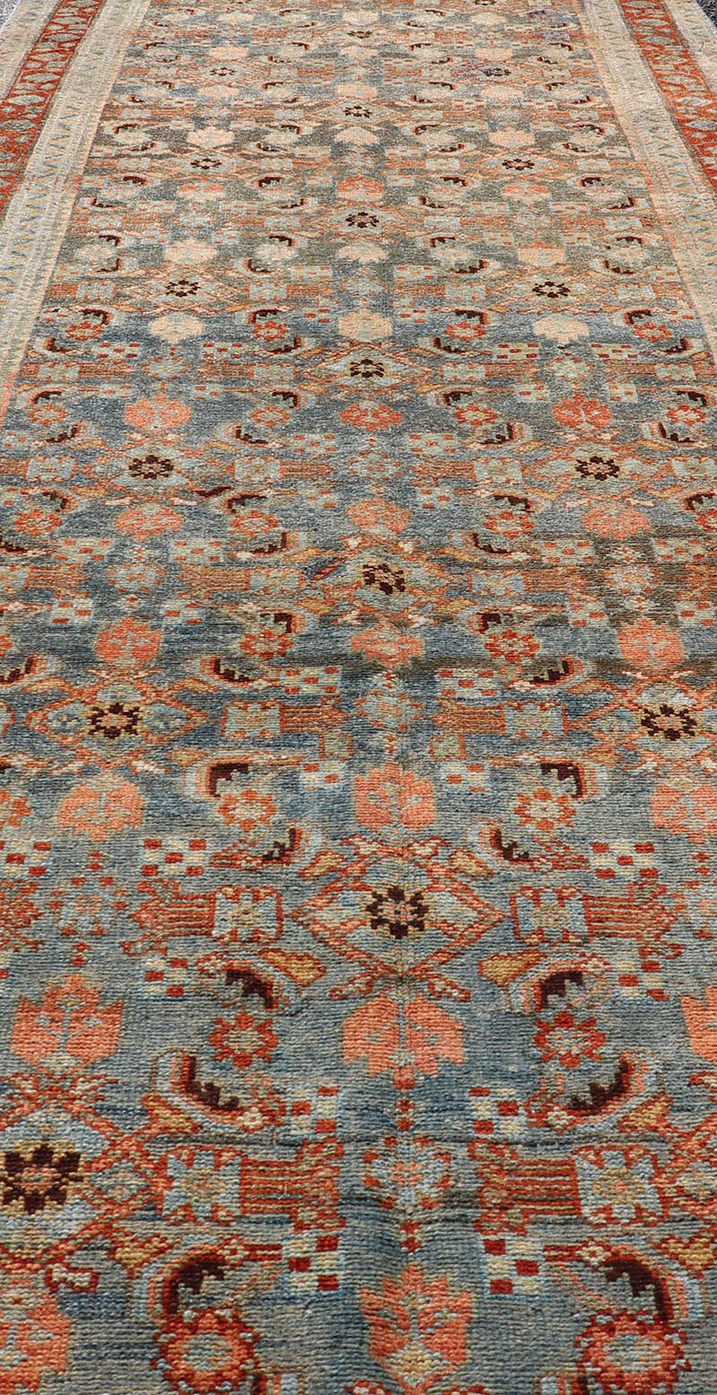 Measures: 3'1 x 15'8 Antique Senneh Persian Long Runner in Wool with All - Over Design in Earthy Tones. Keivan Woven Arts; rug EMB - 22140 - 15046, country of origin / type: Iran / Senneh, circa 1910. This antique Persian long runner Senneh rug has be... - Keivan Woven ArtsEMB - 22140 - 15046 - 20511Rug