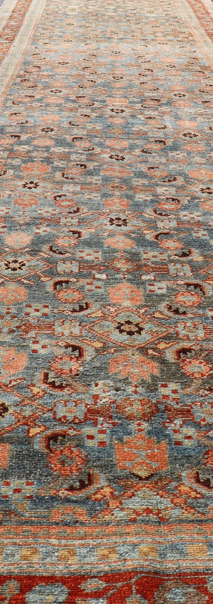 Measures: 3'1 x 15'8 Antique Senneh Persian Long Runner in Wool with All - Over Design in Earthy Tones. Keivan Woven Arts; rug EMB - 22140 - 15046, country of origin / type: Iran / Senneh, circa 1910. This antique Persian long runner Senneh rug has be... - Keivan Woven ArtsEMB - 22140 - 15046 - 20511Rug