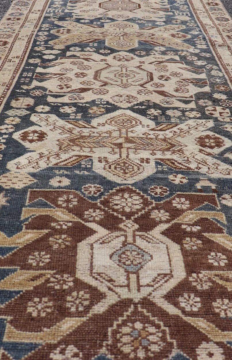 Persian Kurdish Antique Runner with Tribal Medallion Design On Navy Blue Field Keivan Woven Arts / rug EMB - 22146 - 15077, country of origin / type: Iran / Kurdish, circa 1900. Measures: 2'11 x 8'6 Antique Kurdish runner with tribal geometric m... - Keivan Woven ArtsEMB - 22146 - 15077 - 20679