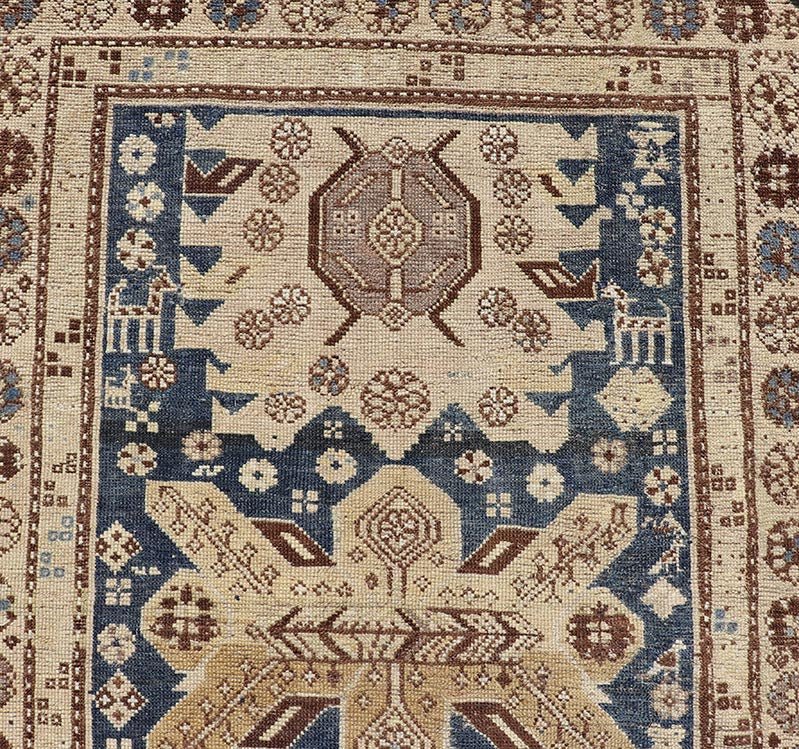 Persian Kurdish Antique Runner with Tribal Medallion Design On Navy Blue Field Keivan Woven Arts / rug EMB - 22146 - 15077, country of origin / type: Iran / Kurdish, circa 1900. Measures: 2'11 x 8'6 Antique Kurdish runner with tribal geometric m... - Keivan Woven ArtsEMB - 22146 - 15077 - 20679Rug