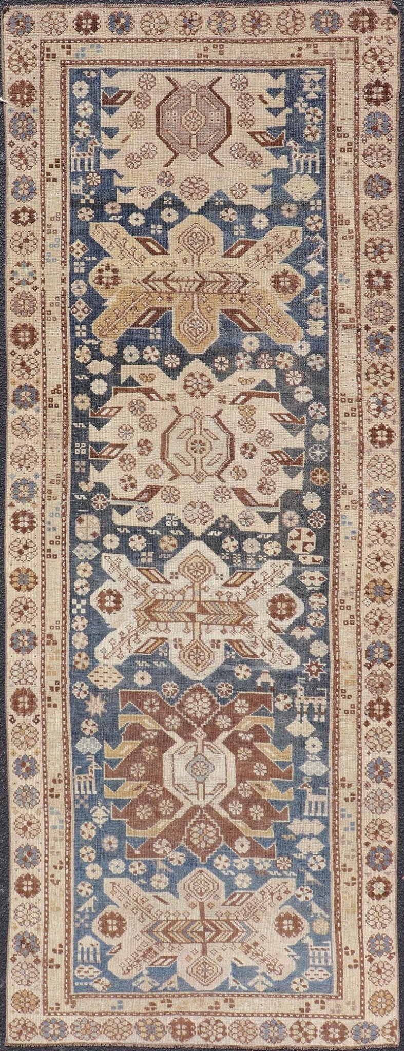 Persian Kurdish Antique Runner with Tribal Medallion Design On Navy Blue Field Keivan Woven Arts / rug EMB - 22146 - 15077, country of origin / type: Iran / Kurdish, circa 1900. Measures: 2'11 x 8'6 Antique Kurdish runner with tribal geometric m... - Keivan Woven ArtsEMB - 22146 - 15077 - 20679Rug
