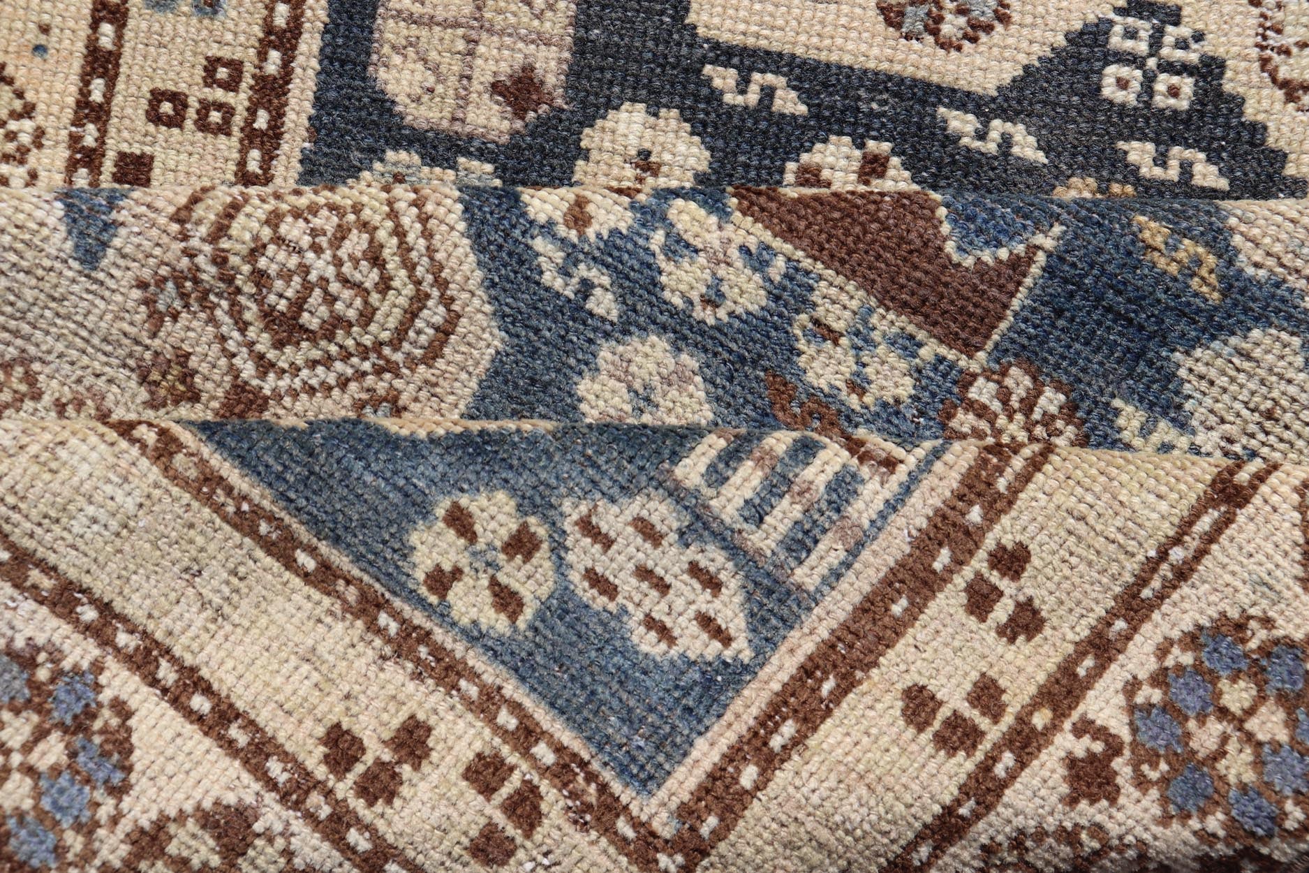 Persian Kurdish Antique Runner with Tribal Medallion Design On Navy Blue Field Keivan Woven Arts / rug EMB - 22146 - 15077, country of origin / type: Iran / Kurdish, circa 1900. Measures: 2'11 x 8'6 Antique Kurdish runner with tribal geometric m... - Keivan Woven ArtsEMB - 22146 - 15077 - 20679