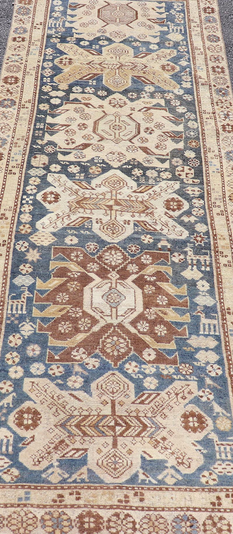 Persian Kurdish Antique Runner with Tribal Medallion Design On Navy Blue Field Keivan Woven Arts / rug EMB - 22146 - 15077, country of origin / type: Iran / Kurdish, circa 1900. Measures: 2'11 x 8'6 Antique Kurdish runner with tribal geometric m... - Keivan Woven ArtsEMB - 22146 - 15077 - 20679