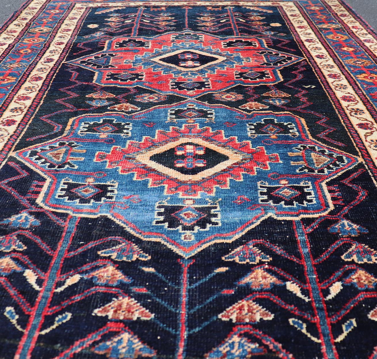 Antique Persian Kurdish Tribal Rug in Sub - Geometric Medallion Design. Country of origin: Iran; Type: Kurdish; Design: Tribal, Floral Tribal; Keivan Woven Arts: EMB - 22151 - 15071. Measures: 4'5 x 7'8 This antique Kurdish rug displays great contrast... - Keivan Woven ArtsEMB - 22151 - 15071 - 20643
