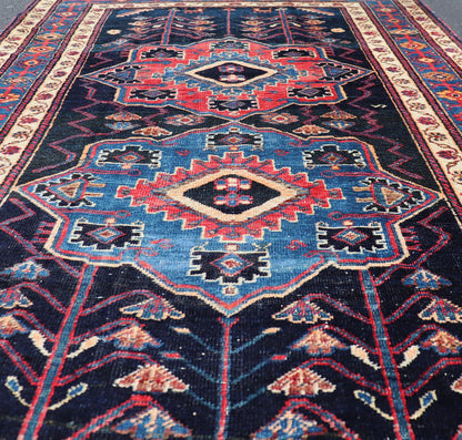 Antique Persian Kurdish Tribal Rug in Sub - Geometric Medallion Design. Country of origin: Iran; Type: Kurdish; Design: Tribal, Floral Tribal; Keivan Woven Arts: EMB - 22151 - 15071. Measures: 4'5 x 7'8 This antique Kurdish rug displays great contrast... - Keivan Woven ArtsEMB - 22151 - 15071 - 20643