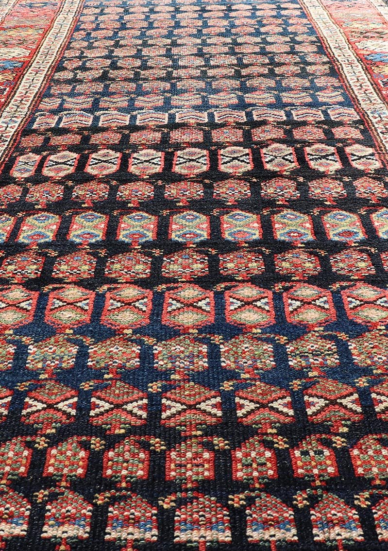 Measures: 3'10 x 9'4 Antique Kurdish Gallery Runner In All - Over Geometric Design on a Blue Background. Country of Origin: Iran; Type: Kurdish; Design: Tribal, Floral, Tribal Motif; Keivan Woven Arts: Rug EMB - 22154 - 15074. This antique galler... - Keivan Woven ArtsEMB - 22154 - 15074 - 20661