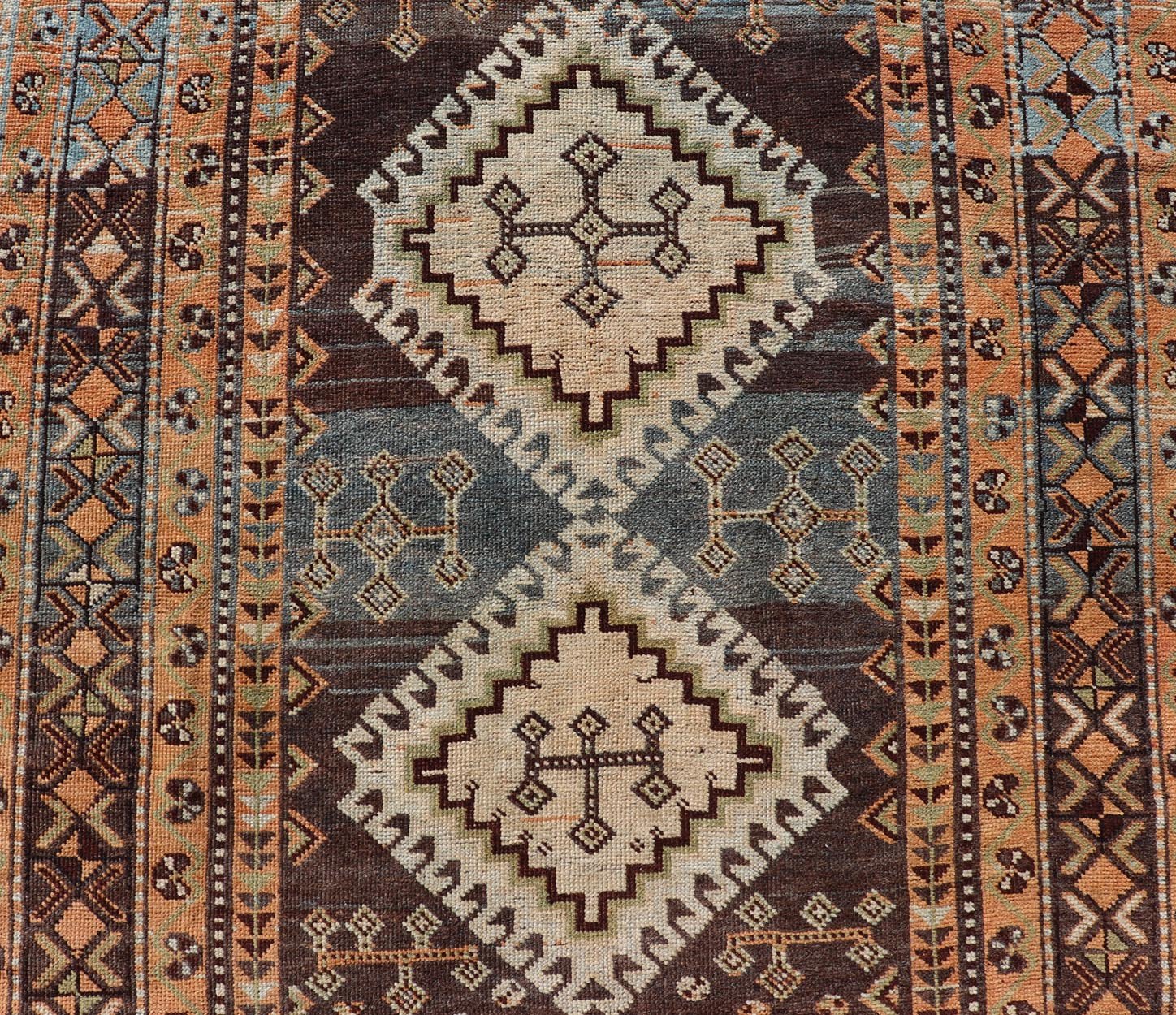 Measures: 4'5 x 8'8 Antique Persian Lori Rug with All - Over Geometric Tribal Medallion Design. Keivan Woven Arts / rug EMB - 22156 - 15069, country of origin / type: Iran / lori, circa 1900 This beautiful antique early 20th century Persian tribal... - Keivan Woven ArtsEMB - 22156 - 15069 - 20637Rug