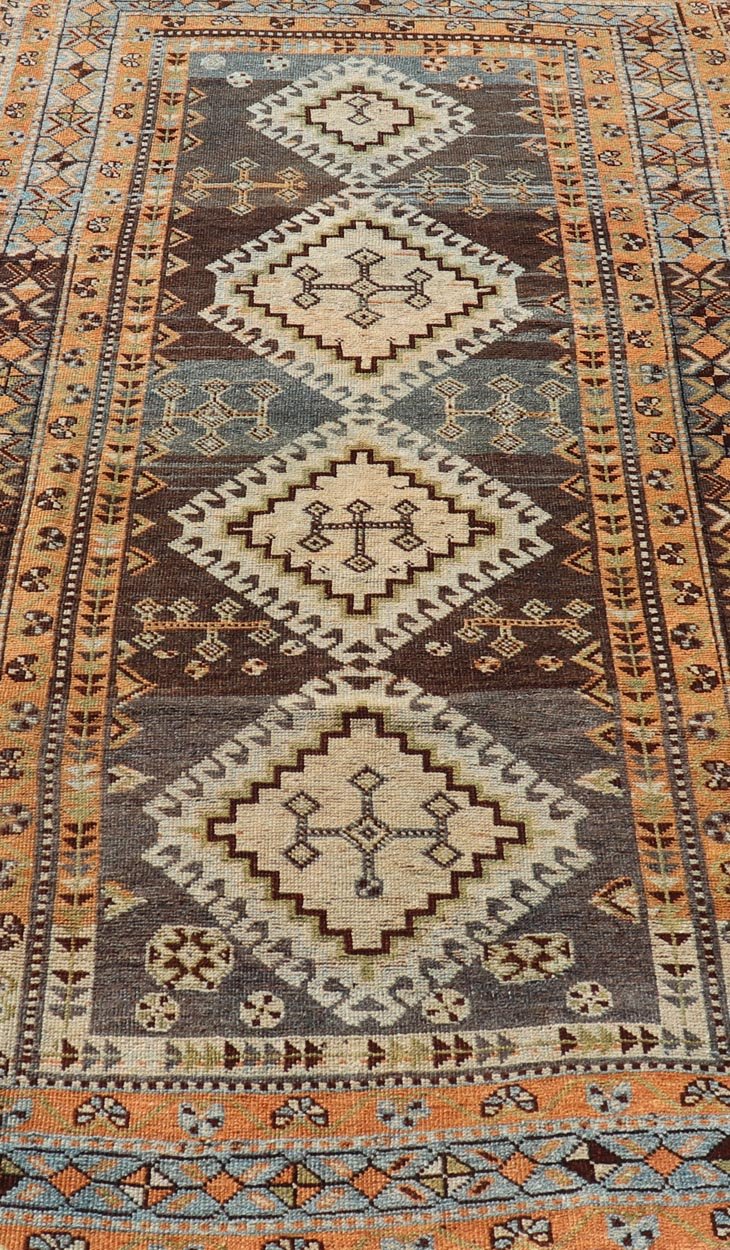Measures: 4'5 x 8'8 Antique Persian Lori Rug with All - Over Geometric Tribal Medallion Design. Keivan Woven Arts / rug EMB - 22156 - 15069, country of origin / type: Iran / lori, circa 1900 This beautiful antique early 20th century Persian tribal... - Keivan Woven ArtsEMB - 22156 - 15069 - 20637Rug