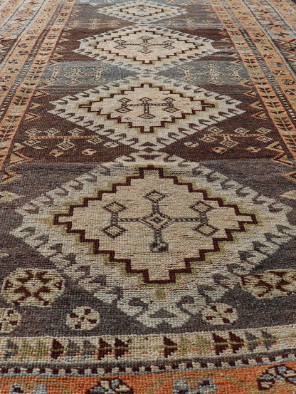 Measures: 4'5 x 8'8 Antique Persian Lori Rug with All - Over Geometric Tribal Medallion Design. Keivan Woven Arts / rug EMB - 22156 - 15069, country of origin / type: Iran / lori, circa 1900 This beautiful antique early 20th century Persian tribal... - Keivan Woven ArtsEMB - 22156 - 15069 - 20637Rug