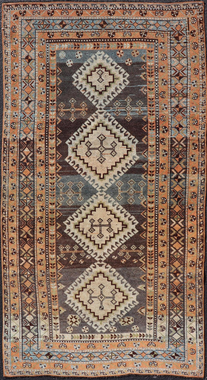 Measures: 4'5 x 8'8 Antique Persian Lori Rug with All - Over Geometric Tribal Medallion Design. Keivan Woven Arts / rug EMB - 22156 - 15069, country of origin / type: Iran / lori, circa 1900 This beautiful antique early 20th century Persian tribal... - Keivan Woven ArtsEMB - 22156 - 15069 - 20637Rug