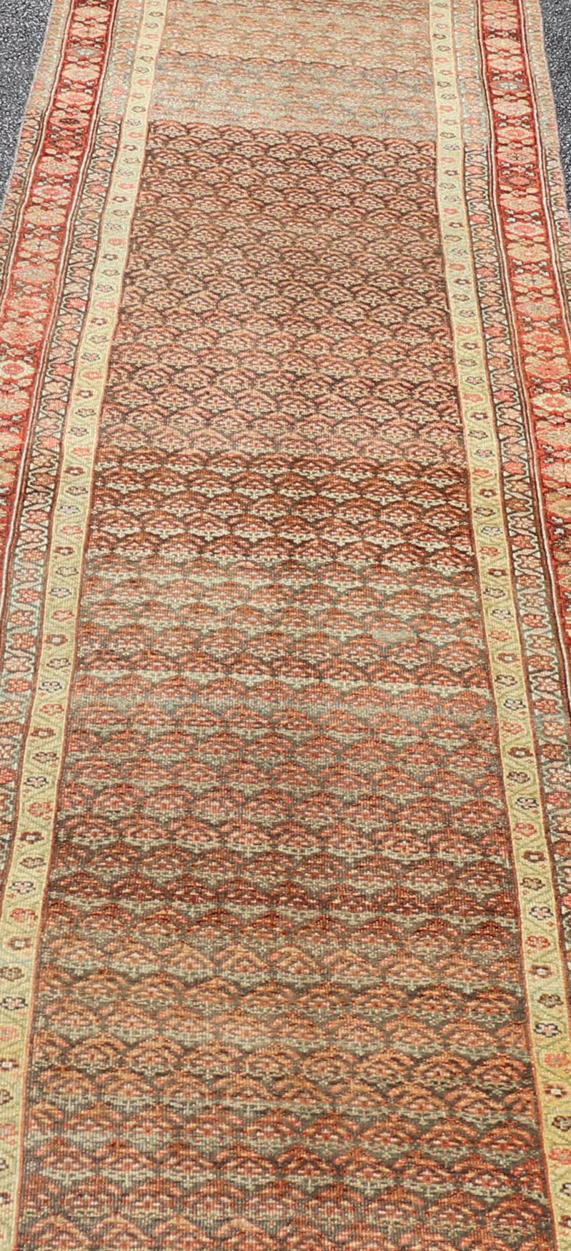 Antique Malayer Persian Long Runner with All Over Paisley Design Red and Brown. Keivan Woven Arts; rug / EMB - 22159 - 15062 Country of origin: Iran Circa 1920's Type Malayer Measures: 3'0 x 15'2 This antique Malayer runner features a modest, multi - ... - Keivan Woven ArtsEMB - 22159 - 15062 - 20595