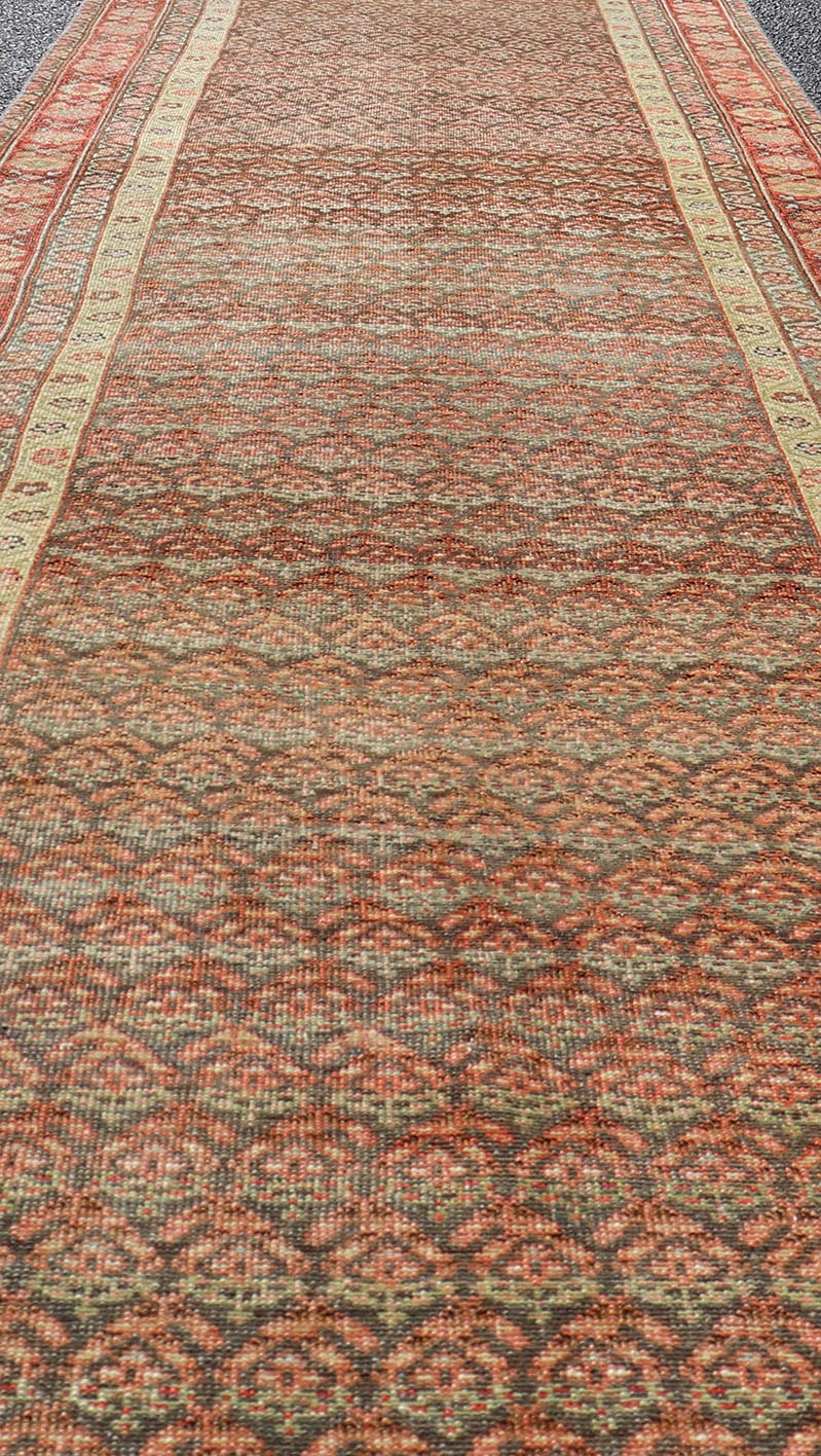 Antique Malayer Persian Long Runner with All Over Paisley Design Red and Brown. Keivan Woven Arts; rug / EMB - 22159 - 15062 Country of origin: Iran Circa 1920's Type Malayer Measures: 3'0 x 15'2 This antique Malayer runner features a modest, multi - ... - Keivan Woven ArtsEMB - 22159 - 15062 - 20595