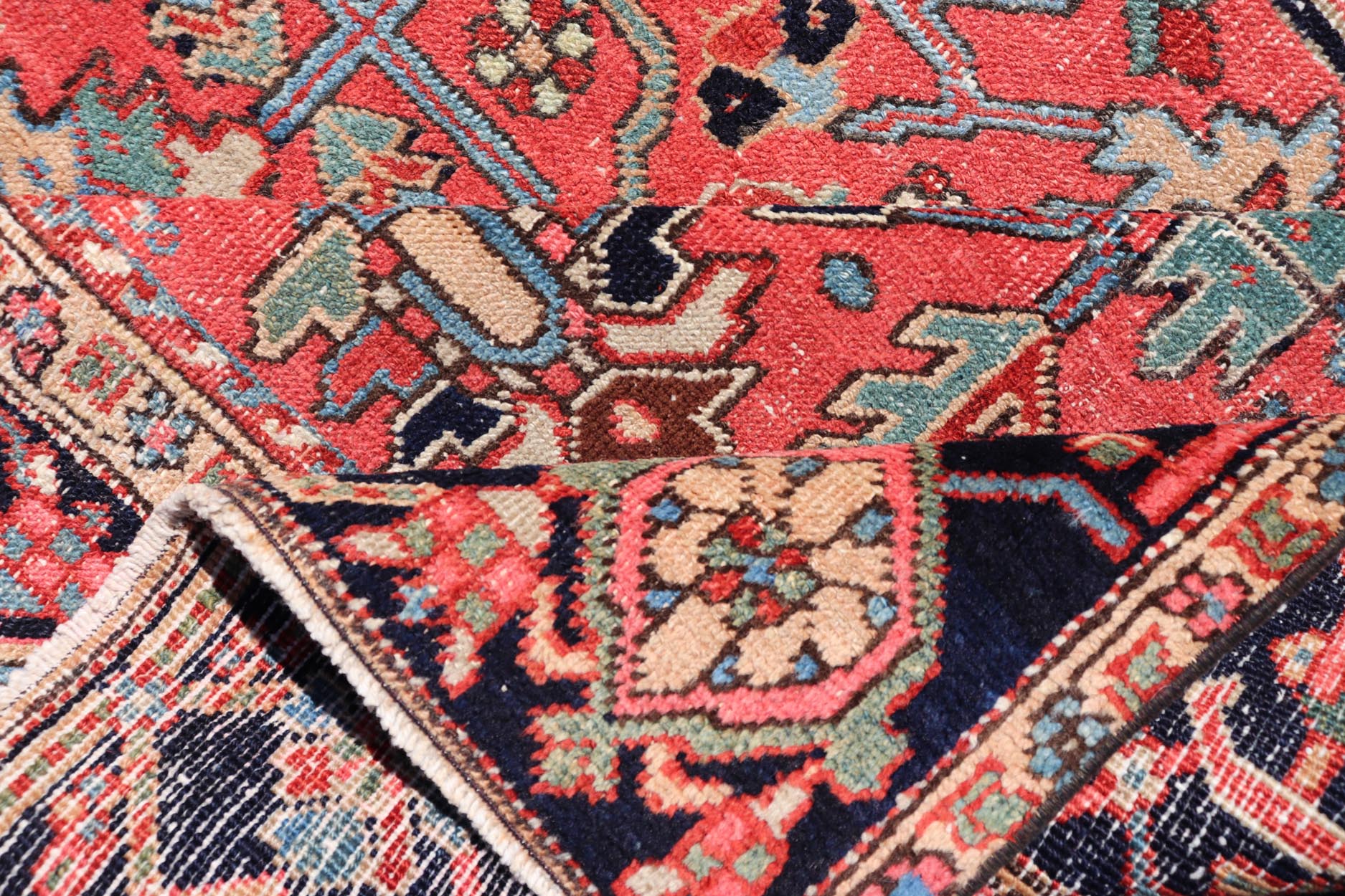 Persian Antique Heriz Rug with All - Over Geometric Design in Jewel Tones. Keivan Woven Arts / Rug / EMB - 22161 - 15110, country of origin / type: Iran /Heriz, circa 1920 Measures: 7'3 x 9'9 This lovely Antique Heriz rug, hailing from northwestern Ira... - Keivan Woven ArtsEMB - 22161 - 15110 - 20818
