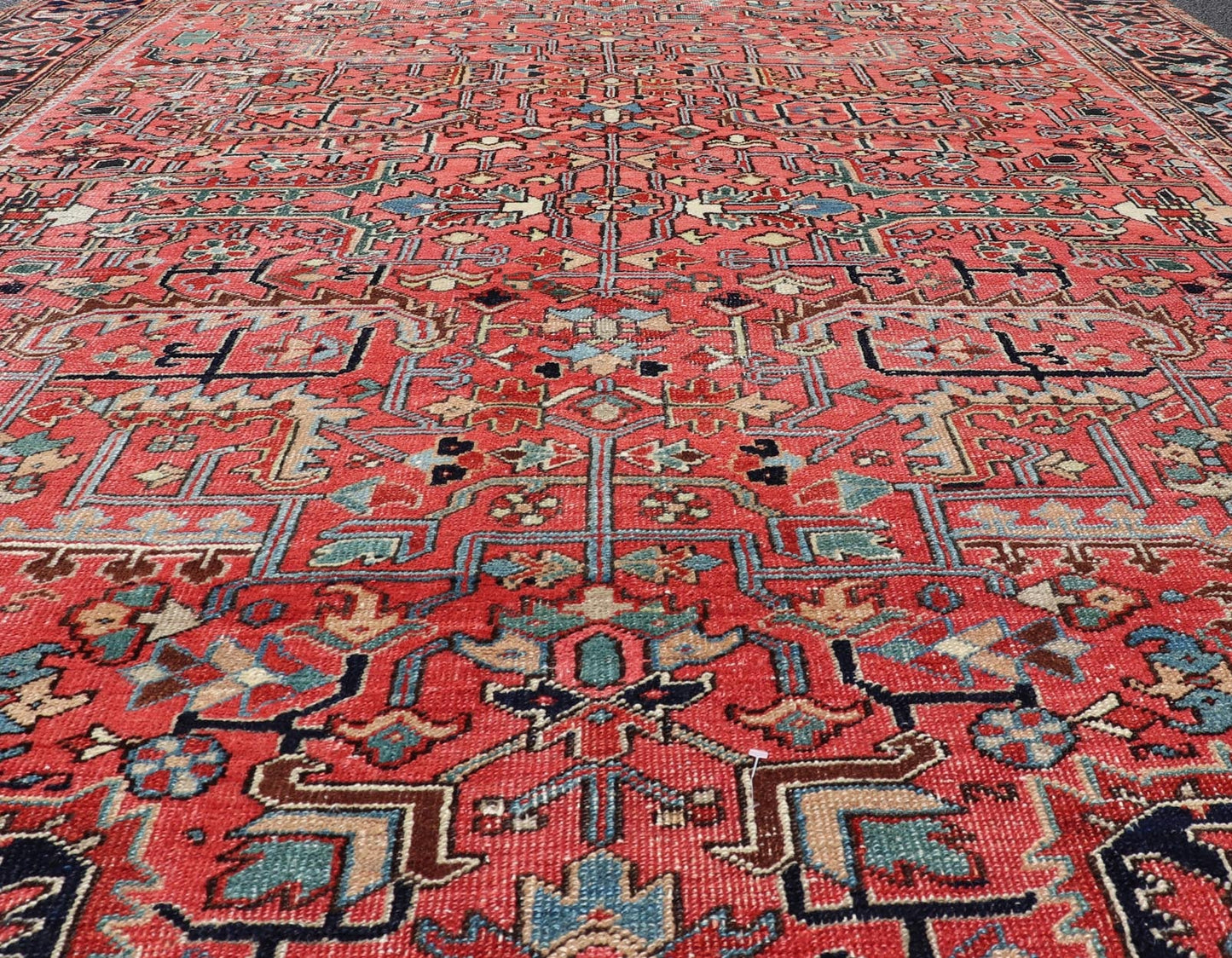Persian Antique Heriz Rug with All - Over Geometric Design in Jewel Tones. Keivan Woven Arts / Rug / EMB - 22161 - 15110, country of origin / type: Iran /Heriz, circa 1920 Measures: 7'3 x 9'9 This lovely Antique Heriz rug, hailing from northwestern Ira... - Keivan Woven ArtsEMB - 22161 - 15110 - 20818Rug