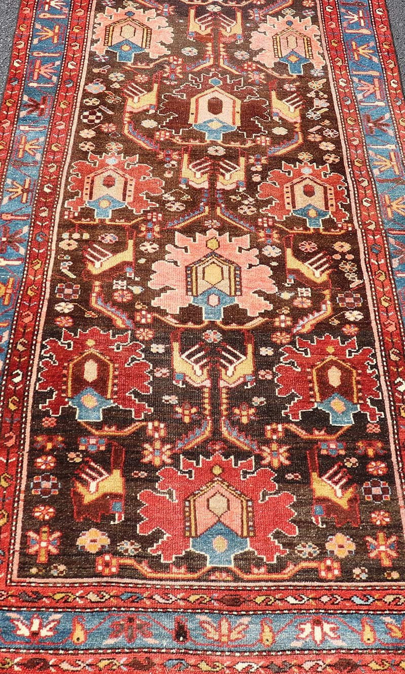 Antique Persian Tribal Designed Hamadan in Multi - Tiered Border in Brown and Blue. Keivan Woven Arts; rug EMB - 22163 - 15049 / Country of Origin: Iran Type: Hamadan Circa 1920 Measures: 3'4 x 9'5 This unique Persian Hamadan features a dark brown ba... - Keivan Woven ArtsEMB - 22163 - 15049 - 20529