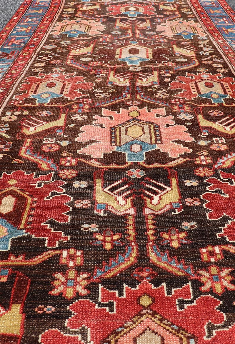 Antique Persian Tribal Designed Hamadan in Multi - Tiered Border in Brown and Blue. Keivan Woven Arts; rug EMB - 22163 - 15049 / Country of Origin: Iran Type: Hamadan Circa 1920 Measures: 3'4 x 9'5 This unique Persian Hamadan features a dark brown ba... - Keivan Woven ArtsEMB - 22163 - 15049 - 20529