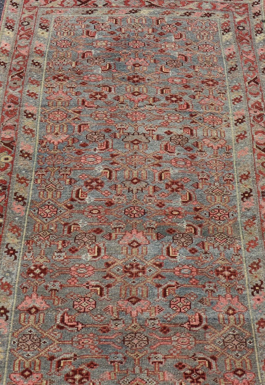 Measures: 3'2 x 6'3 Antique Persian Kurdish Rug in Blue, Green, Brown, and Soft Red. Keivan Woven Arts / rug EMB - 22168 - 15032, Keivan Woven Arts / country of origin / type: Iran / Kurdish, circa 1900. This antique distressed Kurdish tribal ru... - Keivan Woven ArtsEMB - 22168 - 15032 - 20433