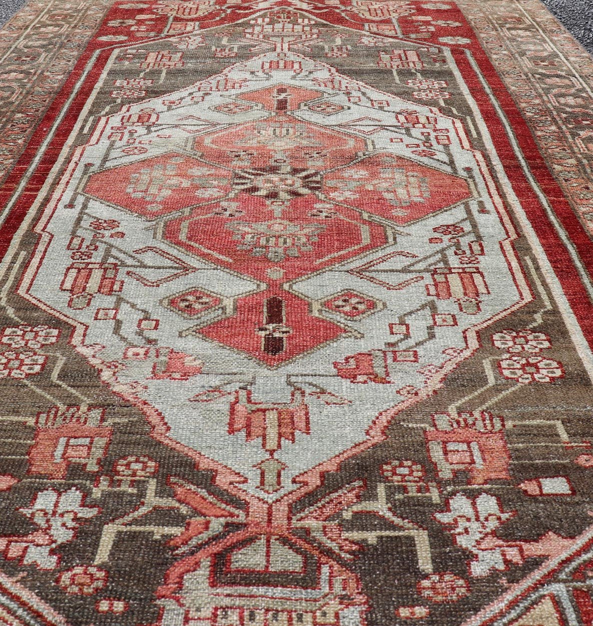 Antique Persian Hamadan Rug with Colorful Geometric Medallion. Keivan Woven Arts / rug EMB - 22173 - 15034, country of origin / type: Iran / Hamadan, circa 1920. Measures: 3'6 x 6'6 - Keivan Woven ArtsEMB - 22173 - 15034 - 20445Rug