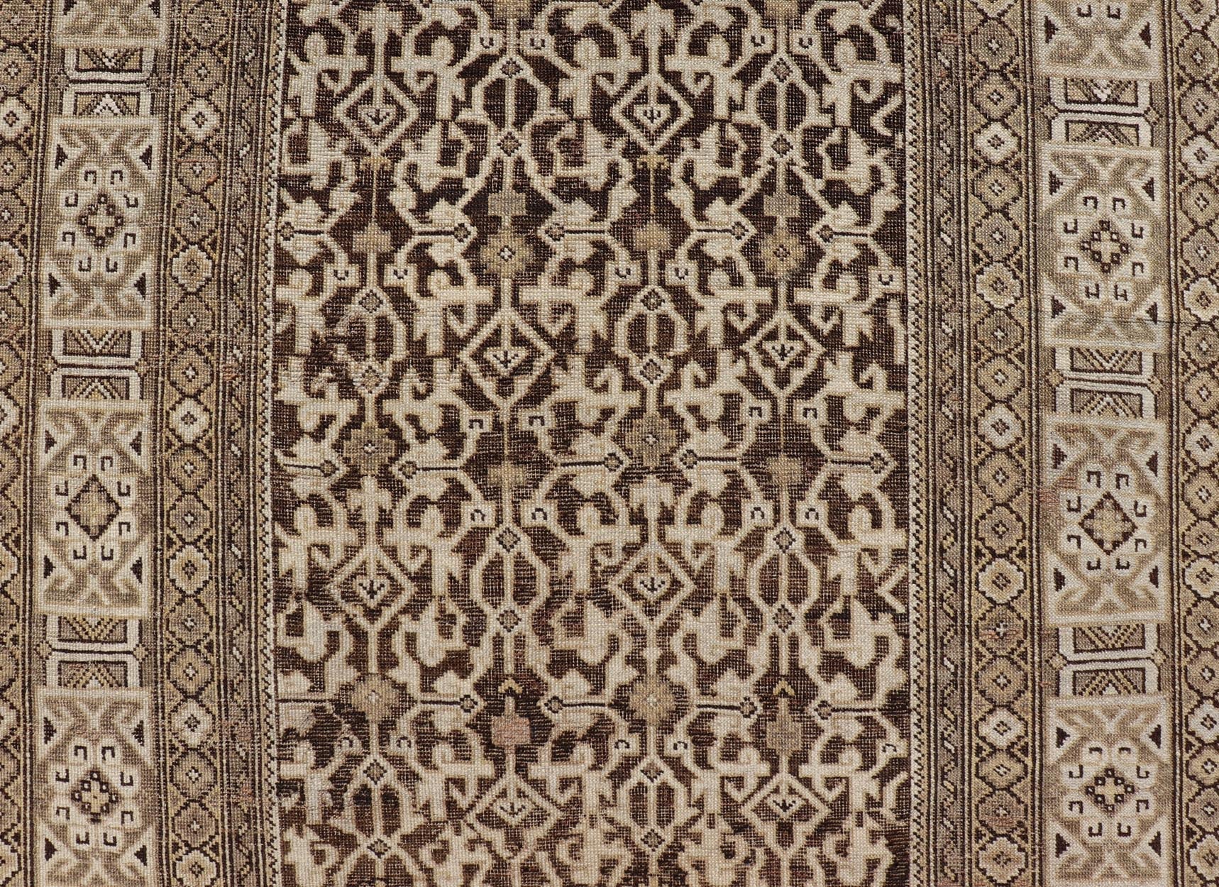 Antique Wool Hand Knotted Caucasian Kazak Rug in Dark Brown Background. Keivan Woven Arts / rug/EMB - 22184 - 15065 Late 19th Century, Kazak rug. Measures: 3'9 x 5'8 This late 19th century antique Caucasian Kazak rug displays a superb Caucasian arab... - Keivan Woven ArtsEMB - 22184 - 15065 - 20613
