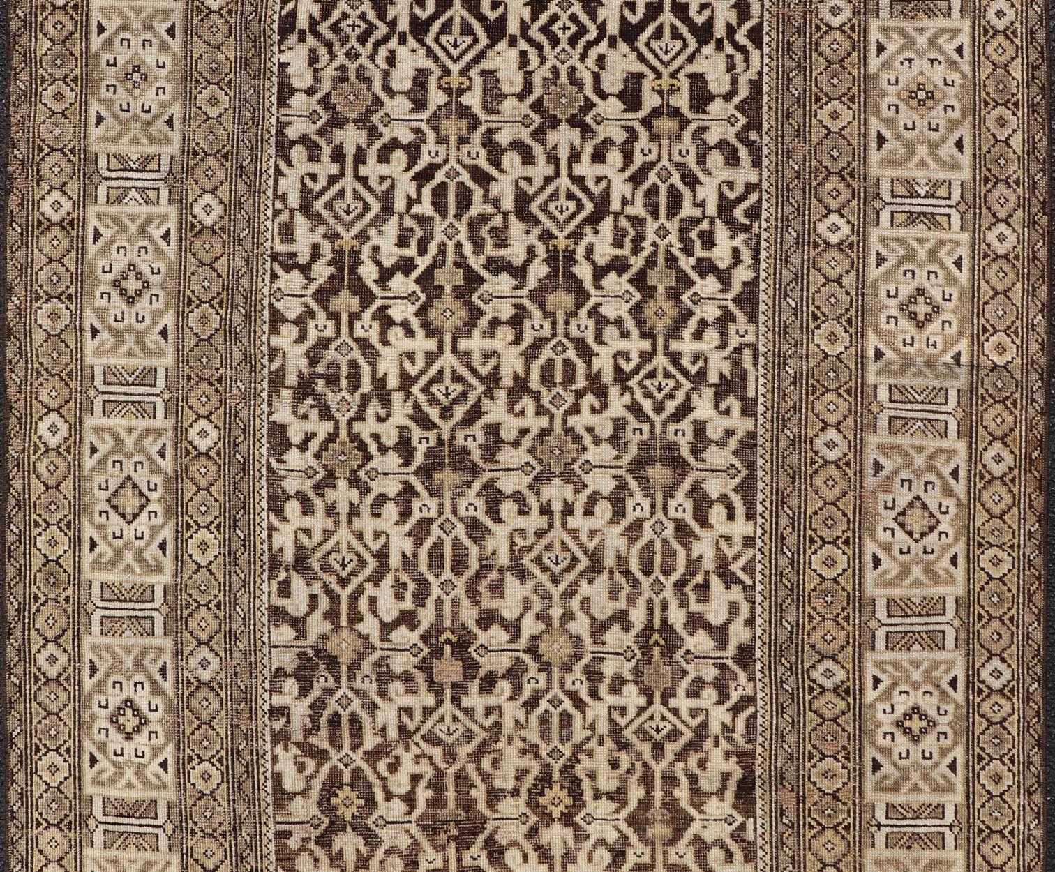 Antique Wool Hand Knotted Caucasian Kazak Rug in Dark Brown Background. Keivan Woven Arts / rug/EMB - 22184 - 15065 Late 19th Century, Kazak rug. Measures: 3'9 x 5'8 This late 19th century antique Caucasian Kazak rug displays a superb Caucasian arab... - Keivan Woven ArtsEMB - 22184 - 15065 - 20613