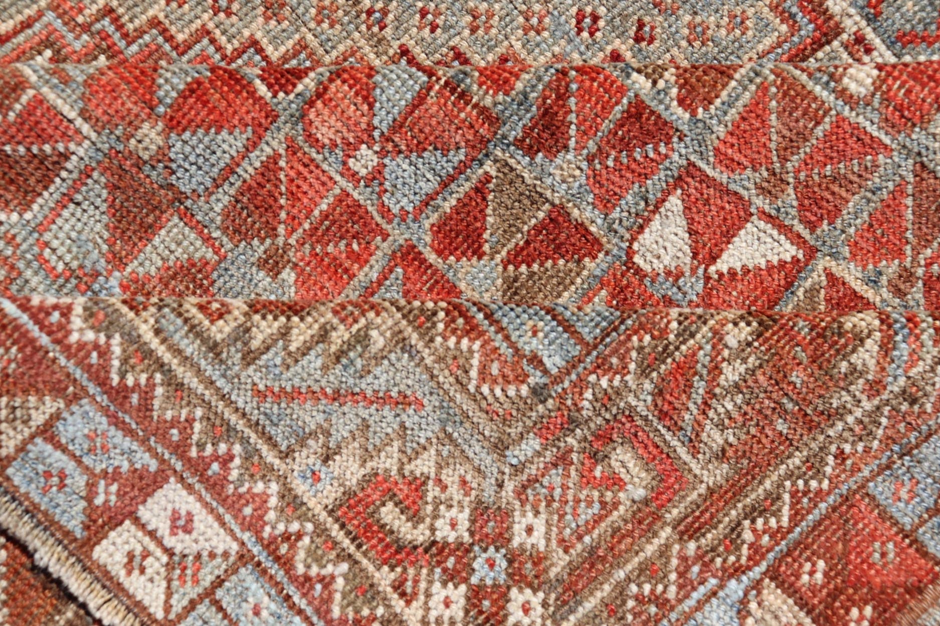 Antique Distressed Persian Medallion Shiraz Rug in Shades Rusty Red & Steel Blue. Keivan Woven Arts / rug EMB - 22190 - 15055, country of origin / type: Iran / Shiraz, circa 1910. Measures: 5'0 x 6'10 This antique distressed Persian Shiraz rug (circ... - Keivan Woven ArtsEMB - 22190 - 15055 - 20565