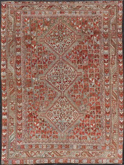 Antique Distressed Persian Medallion Shiraz Rug in Shades Rusty Red & Steel Blue. Keivan Woven Arts / rug EMB - 22190 - 15055, country of origin / type: Iran / Shiraz, circa 1910. Measures: 5'0 x 6'10 This antique distressed Persian Shiraz rug (circ... - Keivan Woven ArtsEMB - 22190 - 15055 - 20565
