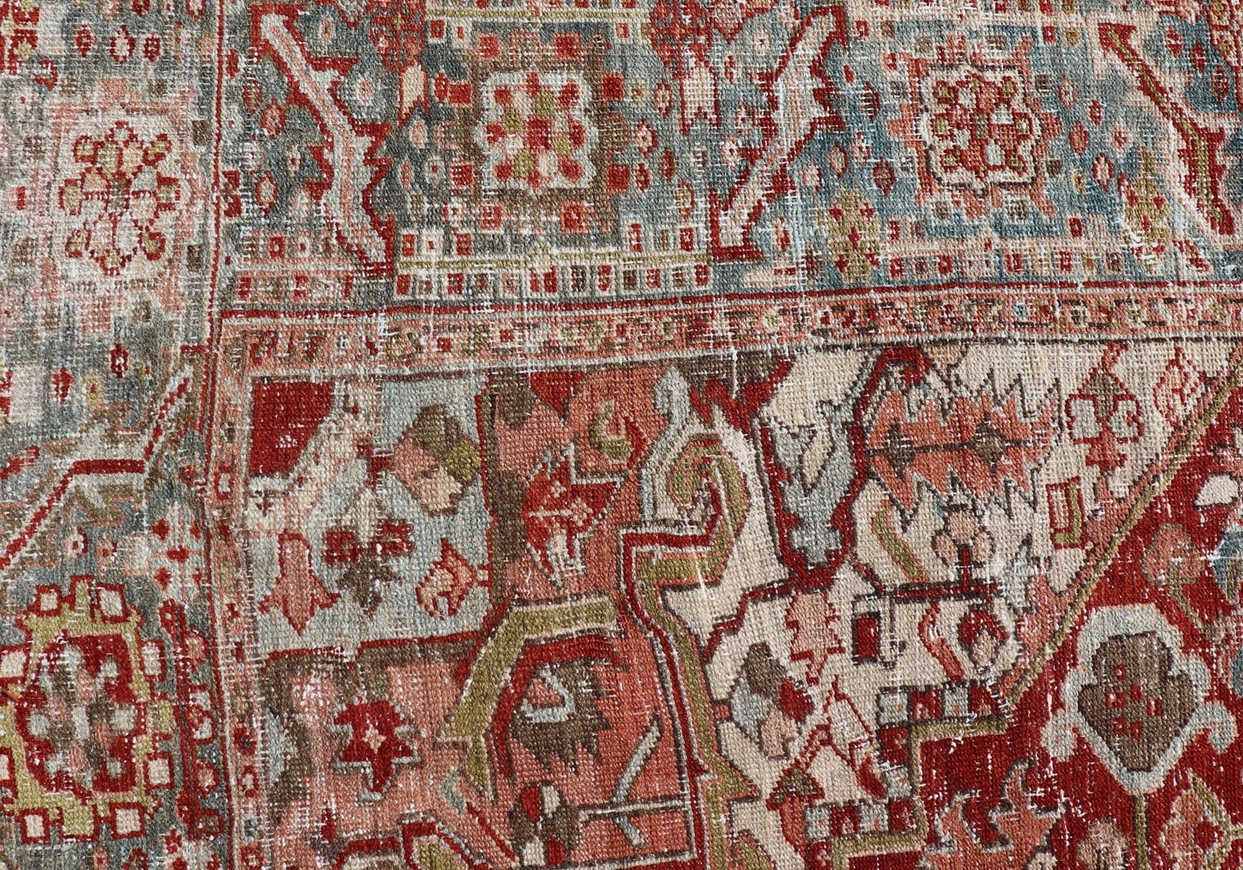 Antique Persian Heriz Rug With Geometric Medallion Design in Red & Soft Colors. Antique Persian Heriz Rug with Geometric Medallion Design. Keivan Woven Arts/ Rug/ EMB - 22193 - 15100, Country/type/ Persian Rug, Heriz. Measures: 6'10 x 9'6 M... - Keivan Woven ArtsEMB - 22193 - 15100 - 20770Rug