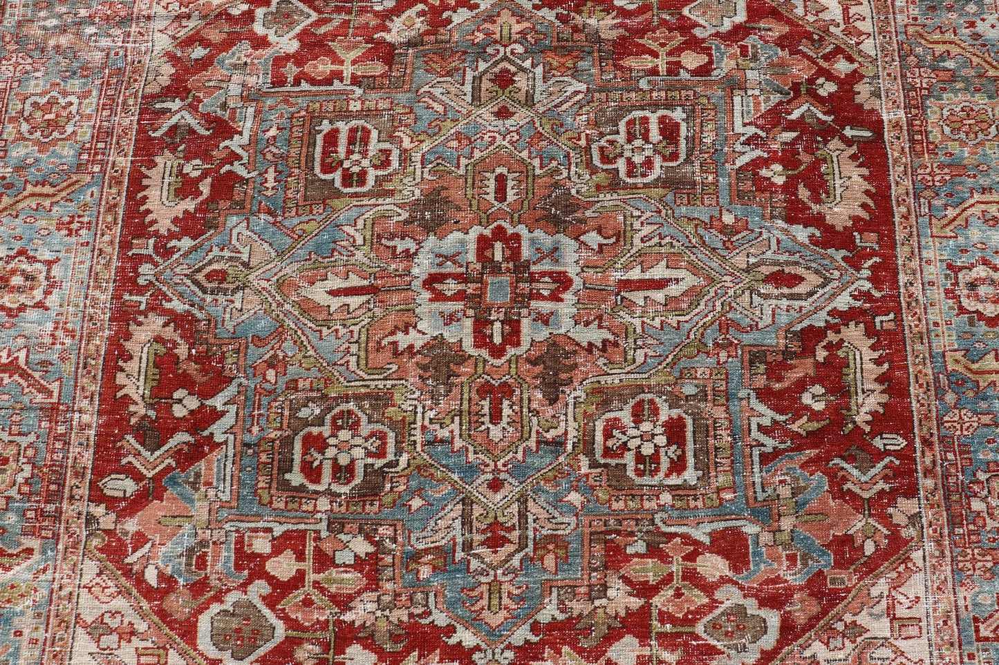 Antique Persian Heriz Rug With Geometric Medallion Design in Red & Soft Colors. Antique Persian Heriz Rug with Geometric Medallion Design. Keivan Woven Arts/ Rug/ EMB - 22193 - 15100, Country/type/ Persian Rug, Heriz. Measures: 6'10 x 9'6 M... - Keivan Woven ArtsEMB - 22193 - 15100 - 20770Rug