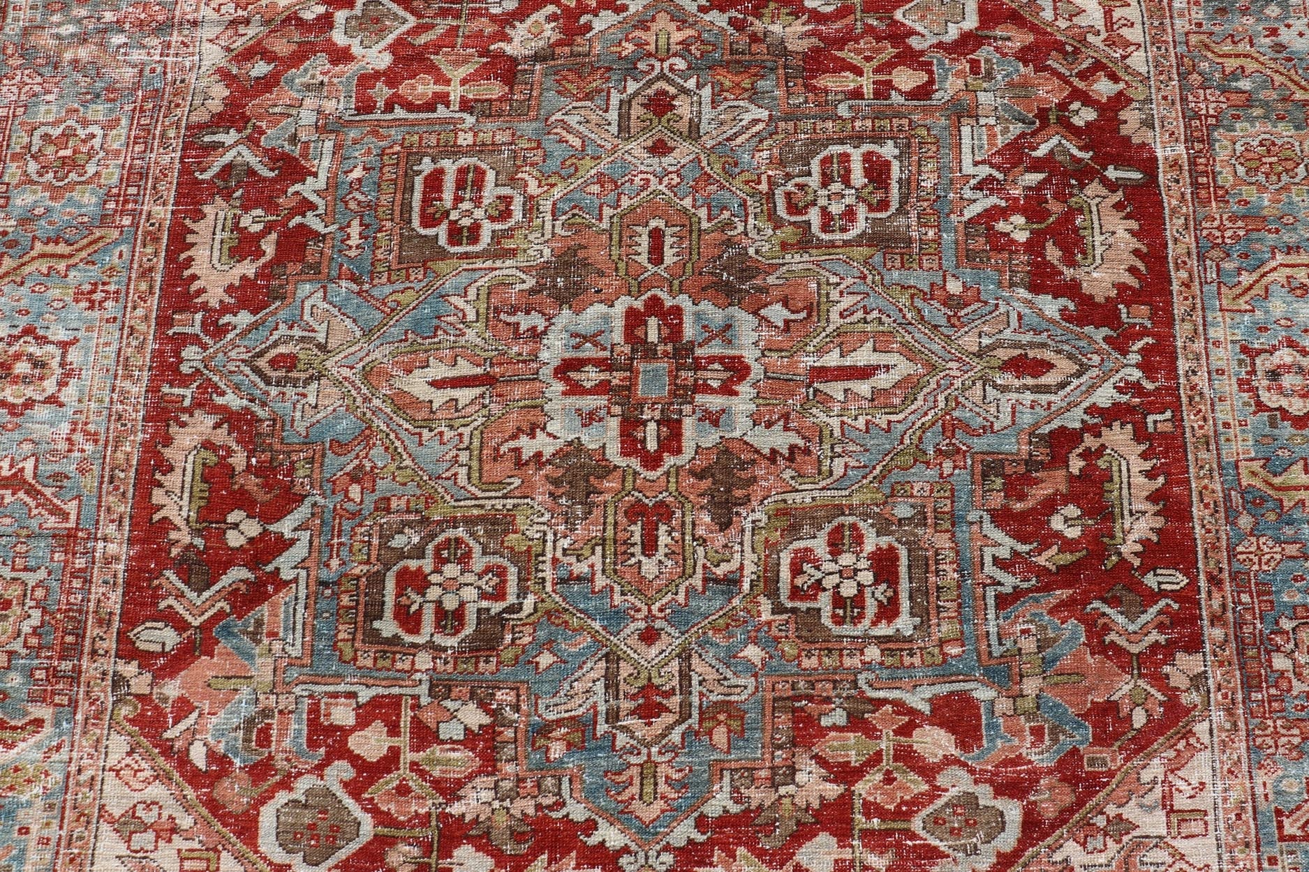 Antique Persian Heriz Rug With Geometric Medallion Design in Red & Soft Colors. Antique Persian Heriz Rug with Geometric Medallion Design. Keivan Woven Arts/ Rug/ EMB - 22193 - 15100, Country/type/ Persian Rug, Heriz. Measures: 6'10 x 9'6 M... - Keivan Woven ArtsEMB - 22193 - 15100 - 20770Rug