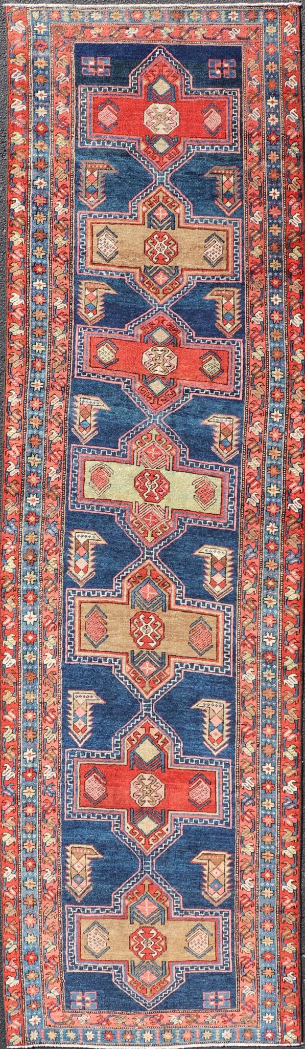Measures: 3'5 x 13'4 Bold Medallion Design Antique Persian Heriz Runner in Red and Blue Tones. Keivan Woven Arts / rug EMB - 22195 - 15097, country of origin / type: Iran / Heriz, circa 1910 This antique Persian Heriz runner, from northwest Iran... - Keivan Woven ArtsEMB - 22195 - 15097 - 20758