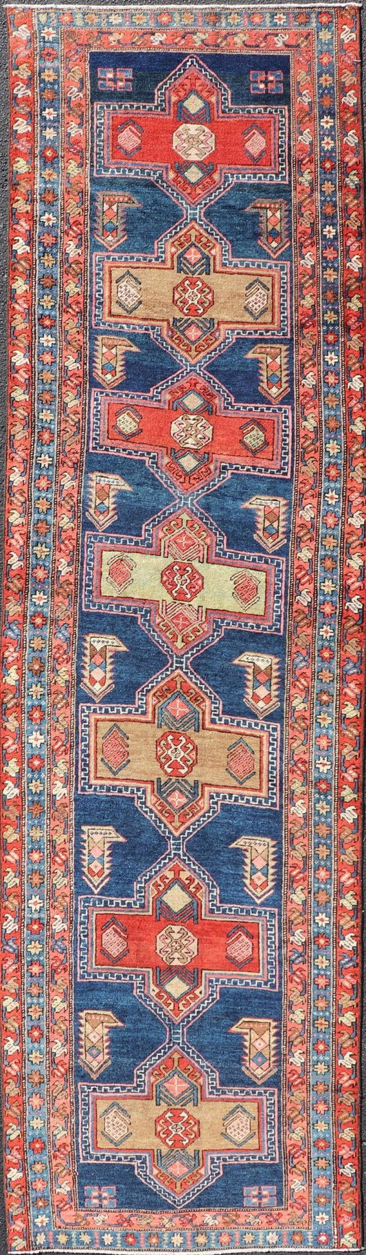 Measures: 3'5 x 13'4 Bold Medallion Design Antique Persian Heriz Runner in Red and Blue Tones. Keivan Woven Arts / rug EMB - 22195 - 15097, country of origin / type: Iran / Heriz, circa 1910 This antique Persian Heriz runner, from northwest Iran... - Keivan Woven ArtsEMB - 22195 - 15097 - 20758