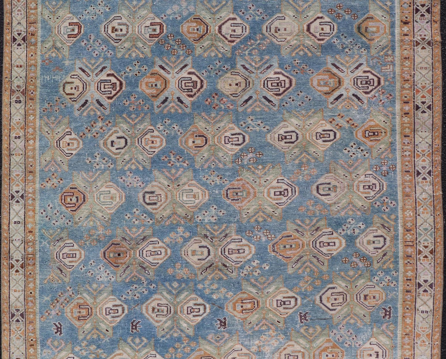 Persian Antique Afshar Rug in Light Blue Background With Tribal Floral Motifs. Keivan Woven Arts / rug EMB - 22196 - 15093, origin/Iran early - 20th century. Afshar Measures: 4'1 x 5'0 Handwoven by Afshar tribal artisan in southeastern Iran, the piece... - Keivan Woven ArtsEMB - 22196 - 15093 - 20740