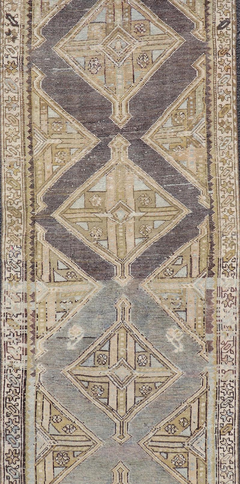 Antique Persian Kurdish Runner with Medallion in Charcoal, Blue, And Acid Green. rug EMB - 22202 - 15465, country of origin / type: Kurdish, circa 1900. Persian Kurdish runner in charcoal and gray background. Measures: 2'5 x 9'3 This antique Persian... - Keivan Woven ArtsEMB - 22202 - 15465 - 21113