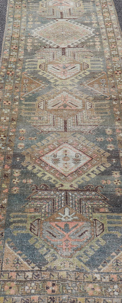 Heriz Antique Persian Rug with Geometric Medallions in Steal Blue, Brown & Peach. Keivan Woven Arts / rug EMB - 22204 - 15460, country of origin / type: Iran / Heriz Serapi, circa 1900 Measures: 3'1 x 13'10 This magnificent Heriz runner woven in the... - Keivan Woven ArtsEMB - 22204 - 15460 - 21125