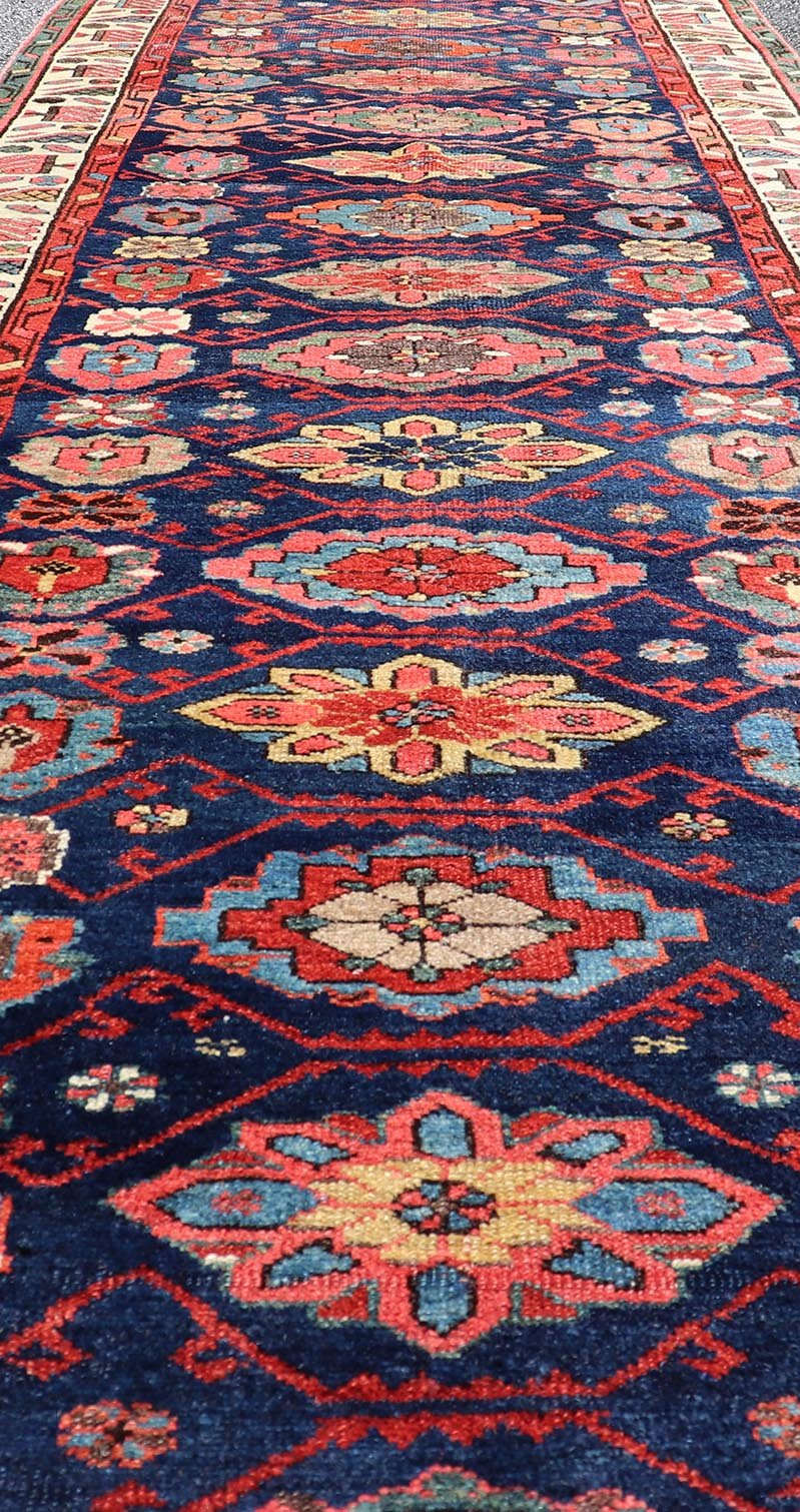Colorful Antique N.W. Persian Runner with Sub - Geometric All - Over Floral Motifs. Keivan Woven Arts / rug EMB - 22209 - 15089, country of origin / type: Iran / N.W. Persian, circa 1920 Measures: 3'2 x 13'3 This Northwest Persian runner features a ... - Keivan Woven ArtsEMB - 22209 - 15089 - 20716Rug