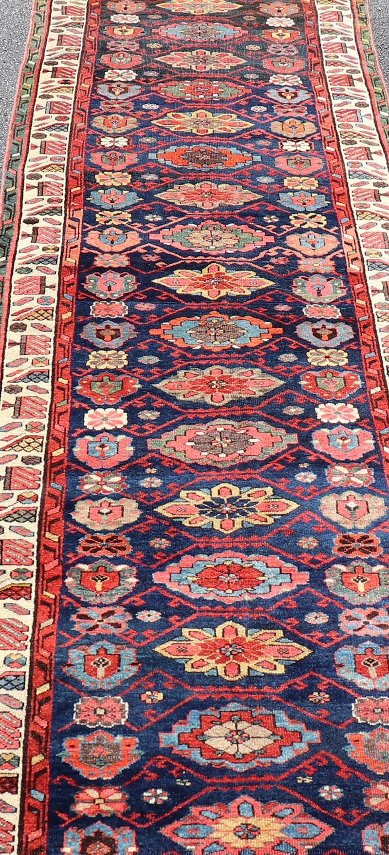 Colorful Antique N.W. Persian Runner with Sub - Geometric All - Over Floral Motifs. Keivan Woven Arts / rug EMB - 22209 - 15089, country of origin / type: Iran / N.W. Persian, circa 1920 Measures: 3'2 x 13'3 This Northwest Persian runner features a ... - Keivan Woven ArtsEMB - 22209 - 15089 - 20716Rug