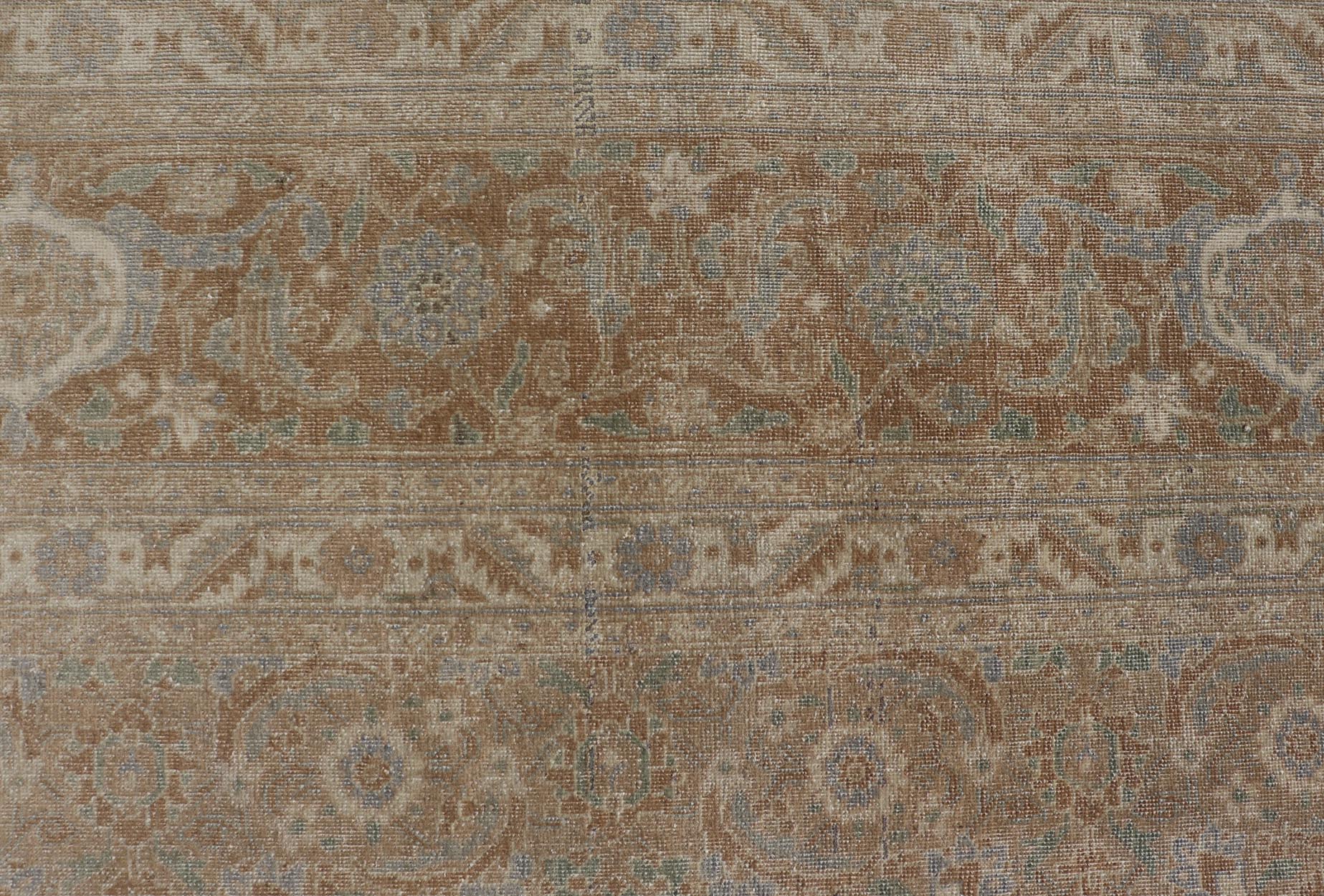 Measures: 8'0 x 10'9 Antique Persian Tabriz Rug in Wool with All - Over Floral Design in Earth Colors. Keivan Woven Arts / rug EMB - 22210 - 15060, country of origin / type: Iran / Tabriz, circa 1920s. This Tabriz rug features a relatively intrica... - Keivan Woven ArtsEMB - 22210 - 15060 - 20583Rug