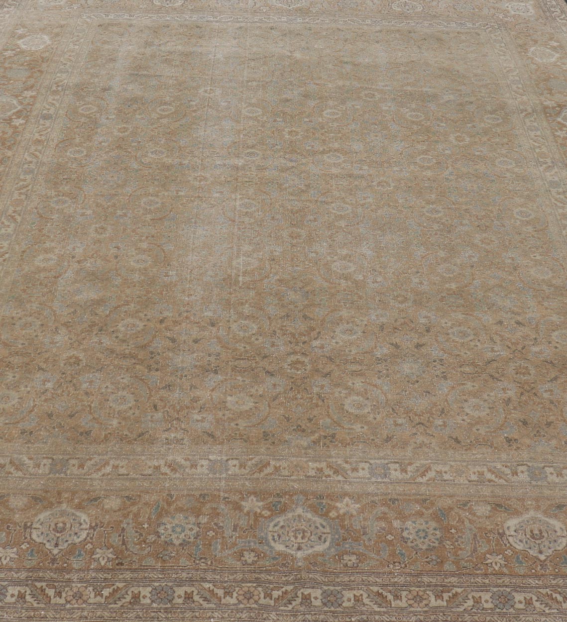 Measures: 8'0 x 10'9 Antique Persian Tabriz Rug in Wool with All - Over Floral Design in Earth Colors. Keivan Woven Arts / rug EMB - 22210 - 15060, country of origin / type: Iran / Tabriz, circa 1920s. This Tabriz rug features a relatively intrica... - Keivan Woven ArtsEMB - 22210 - 15060 - 20583Rug