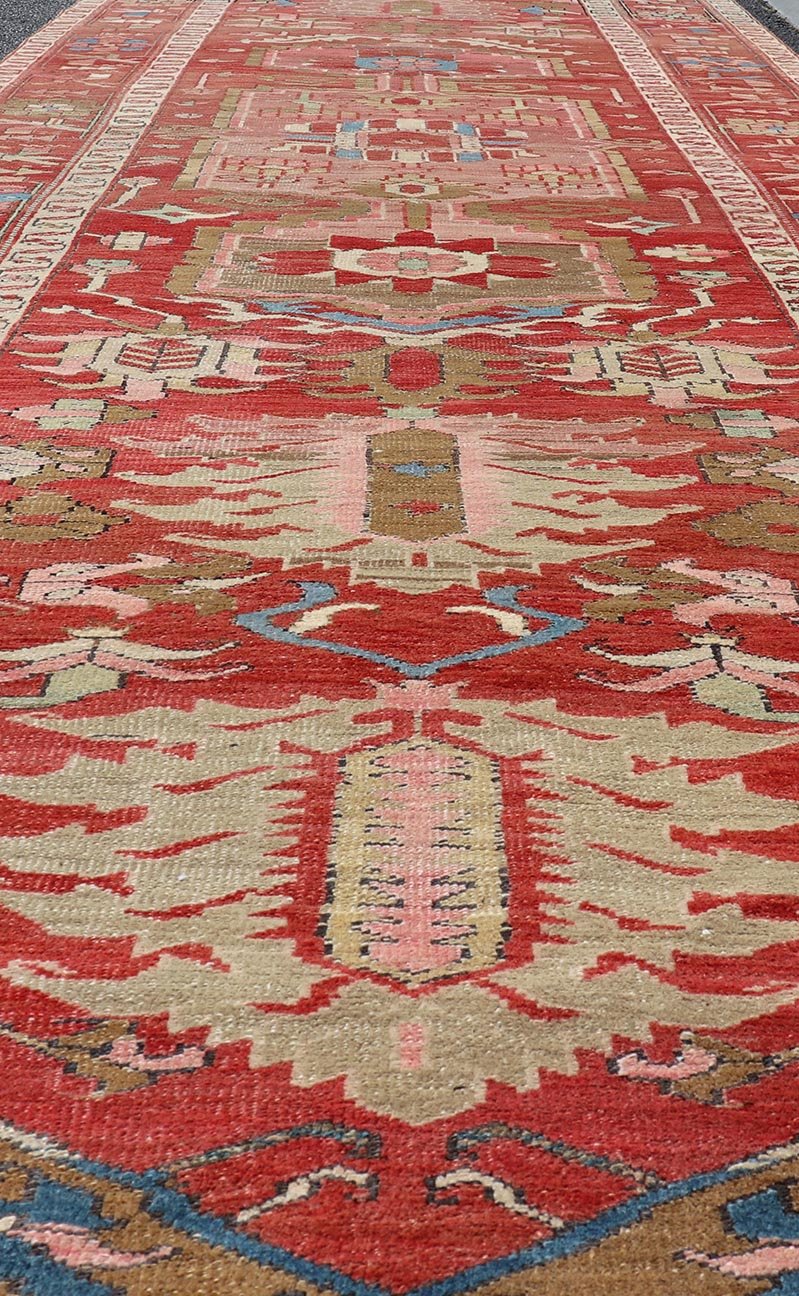 Antique Persian Long Persian Serapi Gallery Runner in Wool with Medallion Design. Keivan Woven Arts; rug EMB - 22214 - 15457, country of origin / type: Iran / Serapi, circa 1900. Measures: 4'9 x 16'9 This antique Persian Serapi rug was hand - knotted ... - Keivan Woven ArtsEMB - 22214 - 15457 - 21137