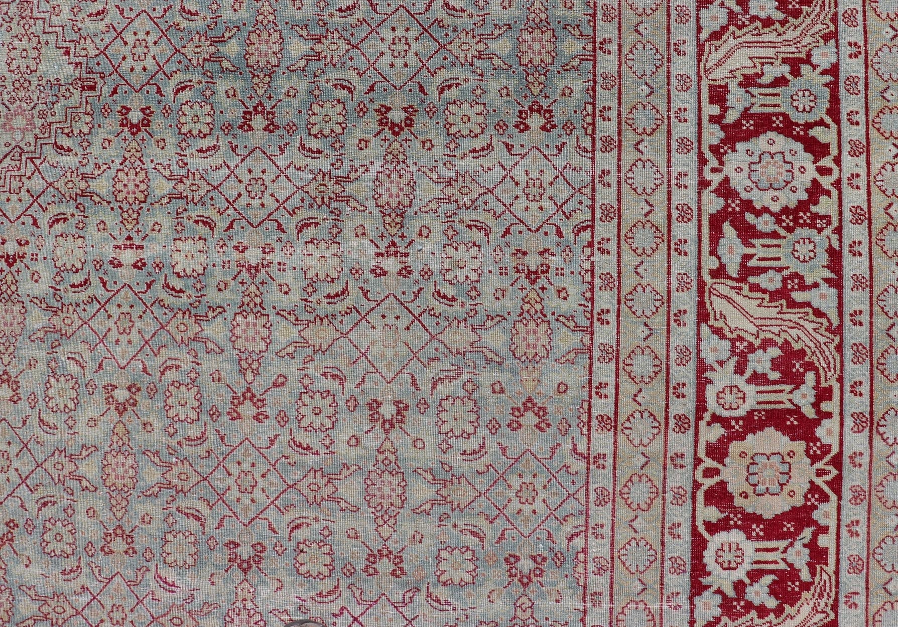 Antique Persian Tabriz Rug with All - Over Herati Design on Blue Field. Keivan Woven Arts / rug EMB - 222201 - 15458, country of origin / type: Iran / Tabriz , circa 1920. Measures: 10'5 x 13'5 This incredible antique distressed Persian Tabriz rug wa... - Keivan Woven ArtsEMB - 222201 - 15458 - 21149Rug