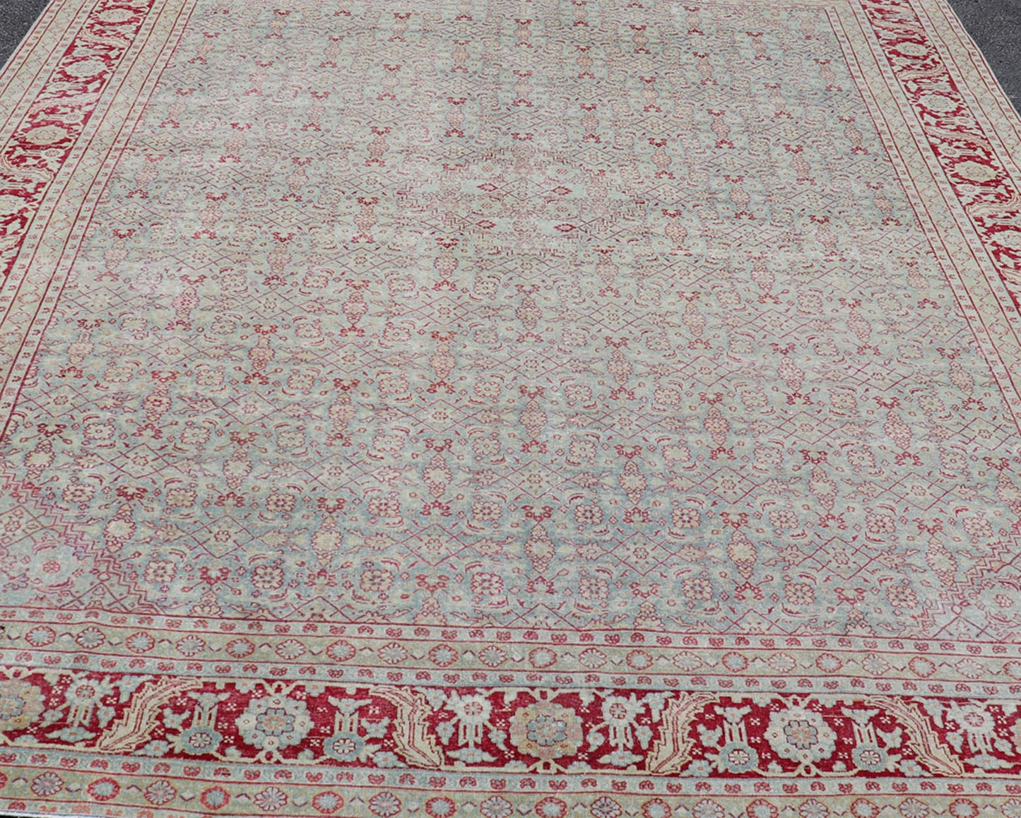 Antique Persian Tabriz Rug with All - Over Herati Design on Blue Field. Keivan Woven Arts / rug EMB - 222201 - 15458, country of origin / type: Iran / Tabriz , circa 1920. Measures: 10'5 x 13'5 This incredible antique distressed Persian Tabriz rug wa... - Keivan Woven ArtsEMB - 222201 - 15458 - 21149Rug