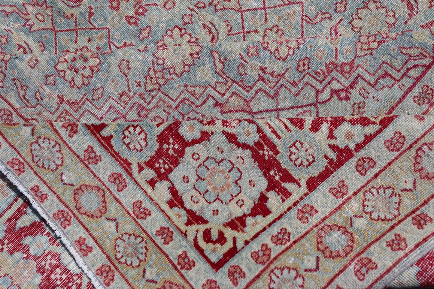 Antique Persian Tabriz Rug with All - Over Herati Design on Blue Field. Keivan Woven Arts / rug EMB - 222201 - 15458, country of origin / type: Iran / Tabriz , circa 1920. Measures: 10'5 x 13'5 This incredible antique distressed Persian Tabriz rug wa... - Keivan Woven ArtsEMB - 222201 - 15458 - 21149
