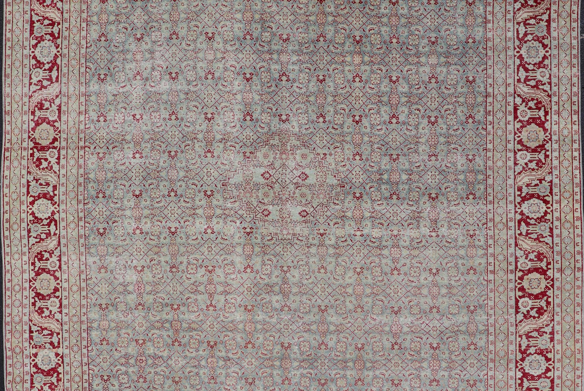 Antique Persian Tabriz Rug with All - Over Herati Design on Blue Field. Keivan Woven Arts / rug EMB - 222201 - 15458, country of origin / type: Iran / Tabriz , circa 1920. Measures: 10'5 x 13'5 This incredible antique distressed Persian Tabriz rug wa... - Keivan Woven ArtsEMB - 222201 - 15458 - 21149
