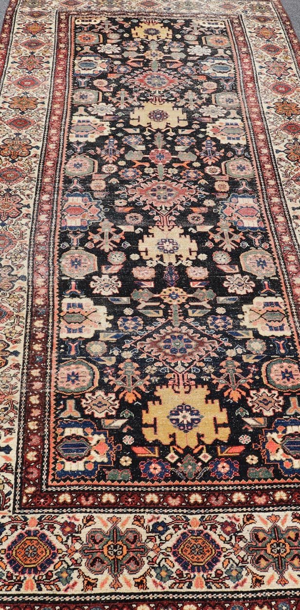 Antique N.W. Persian Large Gallery Rug in navy Blue Background and All - Over Design. Country of Origin: Iran; Type: N.W. Persian; Design: Floral; Keivan Woven Arts: rug/ EMB - 222222 - 15468,.Early 20th century 1900 Measures: 5'2 x 12'10 This... - Keivan Woven ArtsEMB - 222222 - 15468 - 24199Rug