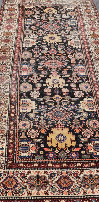 Antique N.W. Persian Large Gallery Rug in navy Blue Background and All - Over Design. Country of Origin: Iran; Type: N.W. Persian; Design: Floral; Keivan Woven Arts: rug/ EMB - 222222 - 15468,.Early 20th century 1900 Measures: 5'2 x 12'10 This... - Keivan Woven ArtsEMB - 222222 - 15468 - 24199Rug