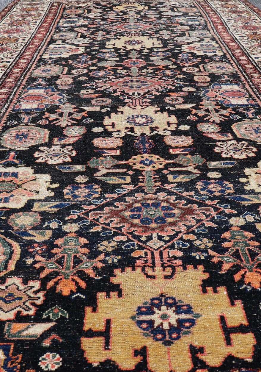 Antique N.W. Persian Large Gallery Rug in navy Blue Background and All - Over Design. Country of Origin: Iran; Type: N.W. Persian; Design: Floral; Keivan Woven Arts: rug/ EMB - 222222 - 15468,.Early 20th century 1900 Measures: 5'2 x 12'10 This... - Keivan Woven ArtsEMB - 222222 - 15468 - 24199Rug
