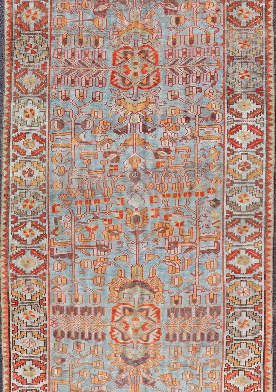 Antique Persian Kurdish Gallery Runner Rug in Wool with Tribal Medallion Design. Keivan Woven Arts; rug EMB - 22224 - 15469, country of origin / type: Iran / Kurdish, circa 1900. Measures: 4'11 x 11'9 This antique Persian Kurdish rug has been ha... - Keivan Woven ArtsEMB - 22224 - 15469 - 21167