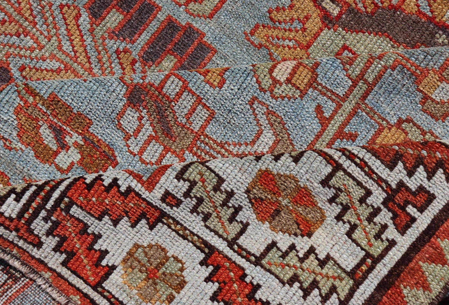 Antique Persian Kurdish Gallery Runner Rug in Wool with Tribal Medallion Design. Keivan Woven Arts; rug EMB - 22224 - 15469, country of origin / type: Iran / Kurdish, circa 1900. Measures: 4'11 x 11'9 This antique Persian Kurdish rug has been ha... - Keivan Woven ArtsEMB - 22224 - 15469 - 21167