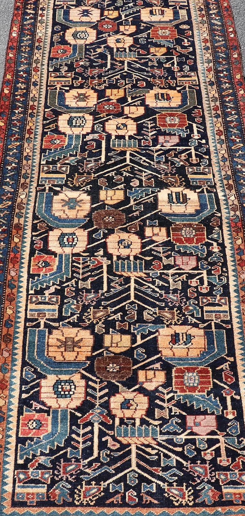 Antique Hamadan Runner in Blue Background Multi Colors With Tribal Motifs. Keivan Woven Arts / rug EMB - 22228 - 15461, country of origin / type: Iran / Hamadan, circa 1920Measures: 3'3 x 9'3 - Keivan Woven ArtsEMB - 22228 - 15461 - 21579Rug